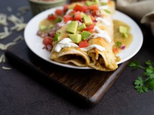 honey lime dairy-free cream cheese enchiladas with toppings